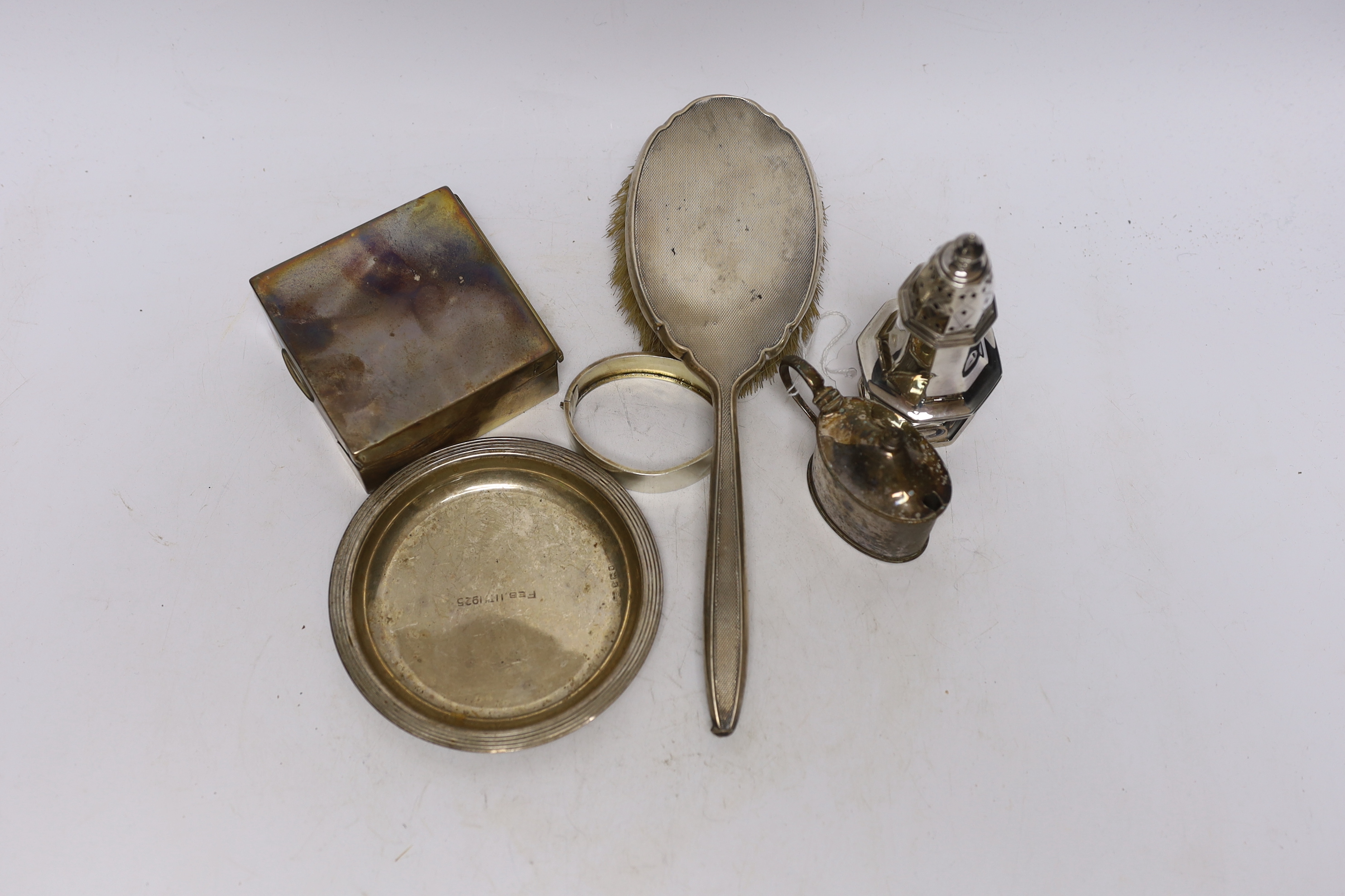 Sundry silver including a mounted hair brush, cigarette box, small dish, bangle, caster and mustard.